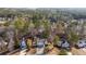 An aerial view of a home surrounded by lush trees at 1620 Cedar Hl, Douglasville, GA 30134