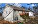 View of the backyard with a wooden deck and exterior of the home at 1620 Cedar Hl, Douglasville, GA 30134