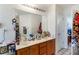 Bathroom featuring double sinks, large mirror, and updated fixtures at 1620 Cedar Hl, Douglasville, GA 30134