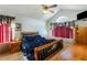 Main bedroom with wood furniture and window seating at 1620 Cedar Hl, Douglasville, GA 30134