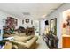 Relaxing living room with fireplace, decorative mirror, and neutral color palette at 1620 Cedar Hl, Douglasville, GA 30134