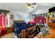 View of the main bedroom with lots of clutter and a large window at 1620 Cedar Hl, Douglasville, GA 30134