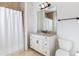 Bright bathroom with a shower/tub combo and granite vanity at 1696 Windsor Ne Pkwy, Atlanta, GA 30319