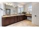 Elegant bathroom with double vanity, granite counters, and large mirror at 1696 Windsor Ne Pkwy, Atlanta, GA 30319