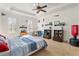 Bright bedroom with carpeted floors, and built-in shelving at 1696 Windsor Ne Pkwy, Atlanta, GA 30319