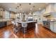 Large kitchen with granite countertops, custom cabinetry, and hardwood floors at 1696 Windsor Ne Pkwy, Atlanta, GA 30319