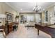 Elegant living room featuring hardwood floors, a piano, and ample natural light at 1696 Windsor Ne Pkwy, Atlanta, GA 30319