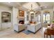 Spacious living room featuring a fireplace and built-in shelving at 1696 Windsor Ne Pkwy, Atlanta, GA 30319