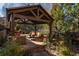 Peaceful backyard patio covered by a wooden pergola with comfortable seating at 1696 Windsor Ne Pkwy, Atlanta, GA 30319