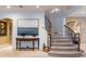 Grand staircase with wrought iron railings and wood accents at 1696 Windsor Ne Pkwy, Atlanta, GA 30319