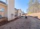 Private backyard with patio and wooded area at 1843 Riverton Dr, Suwanee, GA 30024