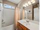 Clean bathroom with tub and shower at 1843 Riverton Dr, Suwanee, GA 30024