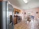 Kitchen features stainless steel appliances and wood cabinets at 1843 Riverton Dr, Suwanee, GA 30024