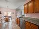 Kitchen with stainless steel appliances and granite countertops at 1843 Riverton Dr, Suwanee, GA 30024