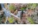 House nestled in wooded lot, driveway, cul-de-sac at 3894 Foxford Dr, Atlanta, GA 30340