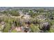 Aerial view showing home nestled in a wooded neighborhood at 3894 Foxford Dr, Atlanta, GA 30340