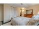 Cozy bedroom with double bed, built-in closet, and dresser at 3894 Foxford Dr, Atlanta, GA 30340