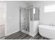 Modern bathroom with a large shower and a free-standing bathtub at 412 Newland Way, Acworth, GA 30102