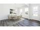 Bright dining room with hardwood floors and large windows at 412 Newland Way, Acworth, GA 30102