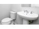 Clean powder room with pedestal sink and toilet at 412 Newland Way, Acworth, GA 30102