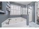 Relaxing bathroom with a soaking tub and a separate shower at 1495 Gabriel Dr, Lawrenceville, GA 30043