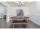 Dining room with a wooden table and bench seating at 1495 Gabriel Dr, Lawrenceville, GA 30043