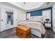 Spacious main bedroom with a large bed and ensuite bathroom access at 1495 Gabriel Dr, Lawrenceville, GA 30043