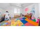 Fun playroom with alphabet floor mats and plenty of toys at 1495 Gabriel Dr, Lawrenceville, GA 30043