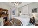 King-size bed in spacious bedroom with fireplace at 407 Bass Se St, Atlanta, GA 30315