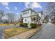 Charming white house with a wraparound porch and a gravel driveway at 407 Bass Se St, Atlanta, GA 30315