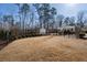 A fenced backyard with a shed and gazebo provides ample outdoor space at 124 Everley Walk, Alpharetta, GA 30009