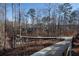 A modern footbridge connects different areas of the community at 124 Everley Walk, Alpharetta, GA 30009