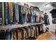 Spacious walk-in closet with metal shelving and racks, providing ample storage space at 124 Everley Walk, Alpharetta, GA 30009