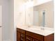 Bathroom with double vanity and large mirror at 5482 Fountainhead Ln, Auburn, GA 30011