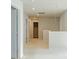 Spacious hallway with carpet and multiple doors at 5482 Fountainhead Ln, Auburn, GA 30011