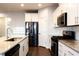 Kitchen features granite countertops and stainless steel appliances at 5482 Fountainhead Ln, Auburn, GA 30011
