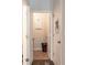 Clean laundry room with washer, dryer, and shelving at 5482 Fountainhead Ln, Auburn, GA 30011