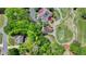 An aerial shot of the property's location near a golf course, emphasizing its peaceful, tree-lined community setting at 5915 Masters Club Dr, Suwanee, GA 30024