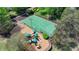 Overhead shot of a basketball court and playground perfect for outdoor fun and recreation at 5915 Masters Club Dr, Suwanee, GA 30024