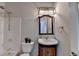 Charming bathroom features stylish fixtures, tiled shower, and a wood vanity at 5915 Masters Club Dr, Suwanee, GA 30024