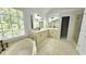 Elegant bathroom with double vanity, soaking tub and separate shower at 5915 Masters Club Dr, Suwanee, GA 30024