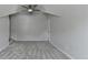 Bedroom featuring a ceiling fan and dormer at 5915 Masters Club Dr, Suwanee, GA 30024