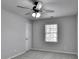 Bedroom with a ceiling fan and window at 5915 Masters Club Dr, Suwanee, GA 30024
