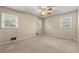 Large bedroom with neutral walls and ceiling fan at 798 Woodvalley Sw Rd, Mableton, GA 30126