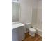Bathroom with updated vanity and tub shower combo at 11564 Holly Ln, Hampton, GA 30228