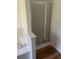 Bathroom with shower and tub. features wood flooring at 11564 Holly Ln, Hampton, GA 30228