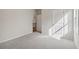 Neutral bedroom features a closet and large window at 405 Westmarch Cir, Loganville, GA 30052