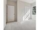 Neutral bedroom with carpet, big windows, and a closet at 405 Westmarch Cir, Loganville, GA 30052