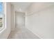 Walk-in closet with adjustable shelving and carpet at 405 Westmarch Cir, Loganville, GA 30052
