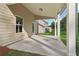 Covered patio with an view overlooking the backyard at 405 Westmarch Cir, Loganville, GA 30052